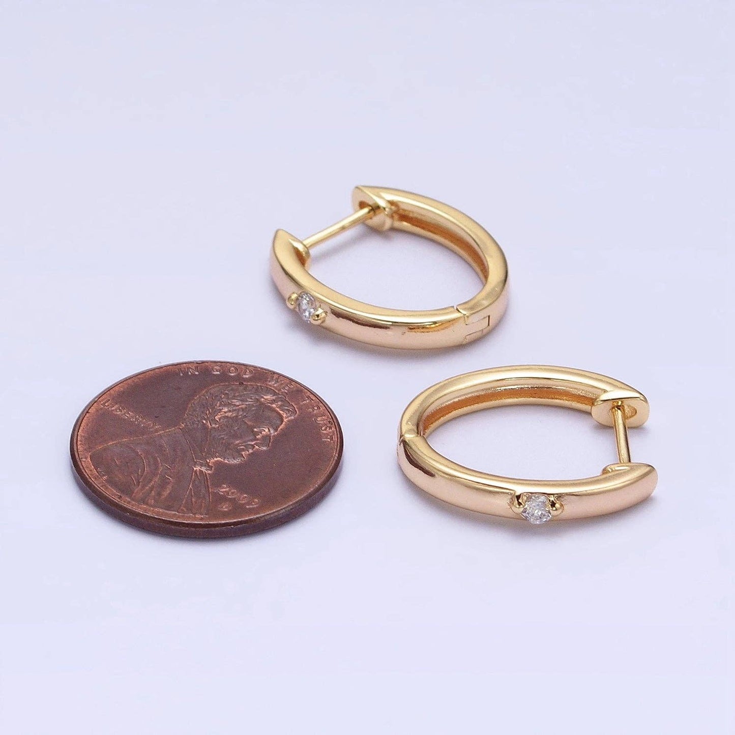 Aim Eternal - Gold Filled CZ Dotted Oval Minimalist Huggie Earrings