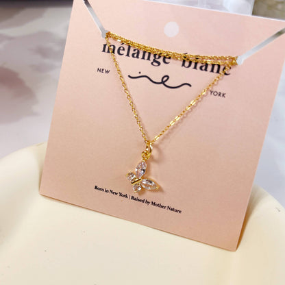 Melange Blanc - N025 gold crystal butterfly charm pendant necklace
