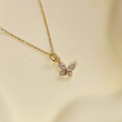 Melange Blanc - N025 gold crystal butterfly charm pendant necklace