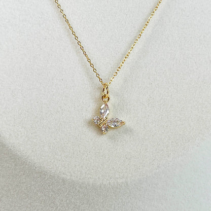 Melange Blanc - N025 gold crystal butterfly charm pendant necklace