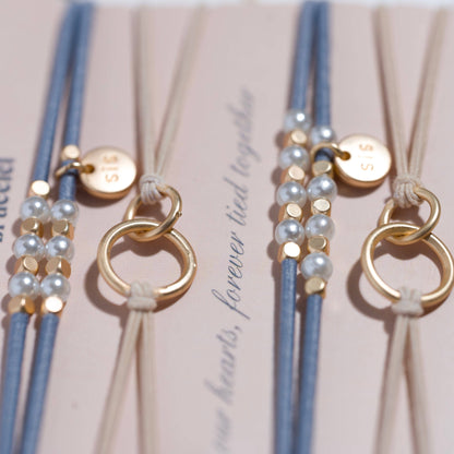 K'lani hair tie bracelets - "Sisters" Gold & Pearl Shareable Hair Tie Bracelet Set