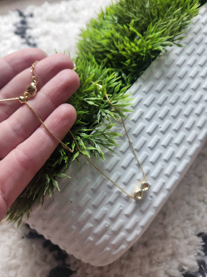 Twig & Rue boutique - Infinity charm gold necklace